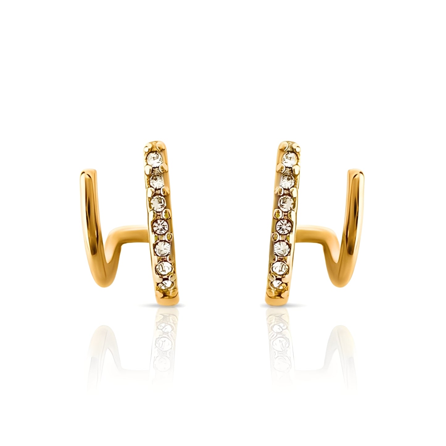 Gold hoop earrings with embedded stones on a white background