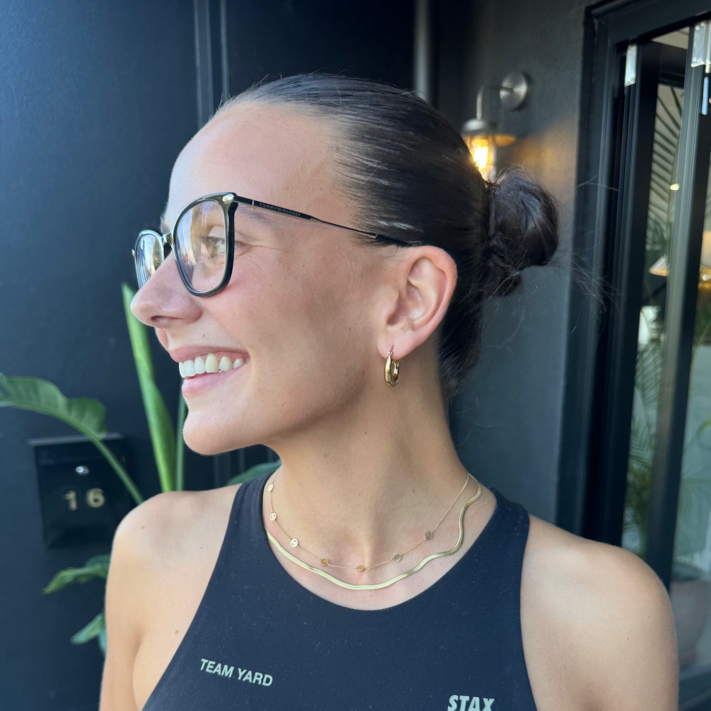 Hustle Hoop Earrings - Large on girl at gym, layering with necklaces
