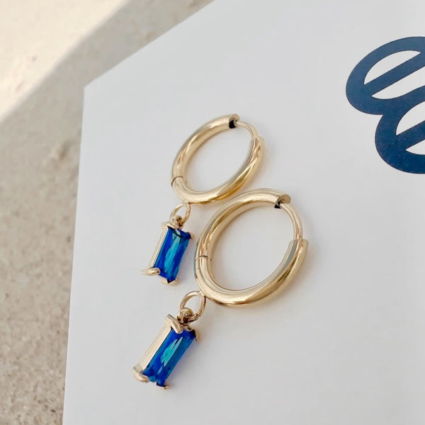 Luxe Gold Drop Earrings Sapphire flat lay - waterproof anti-tarnish sapphire gold drop earrings Australia - EVER Jewellery