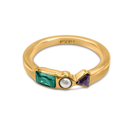 Gold ring with green, white, and purple gemstones on a white background