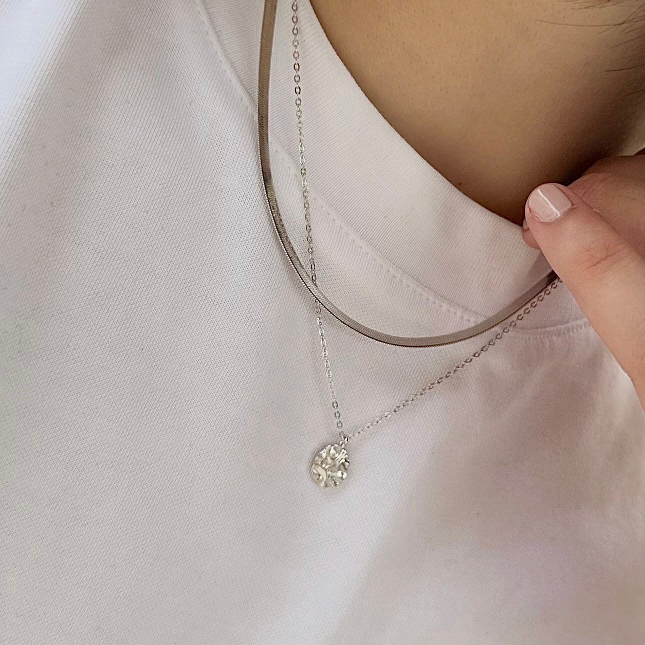 Harmony Silver Necklace layered with snake chain – waterproof jewellery styled casually over white tee