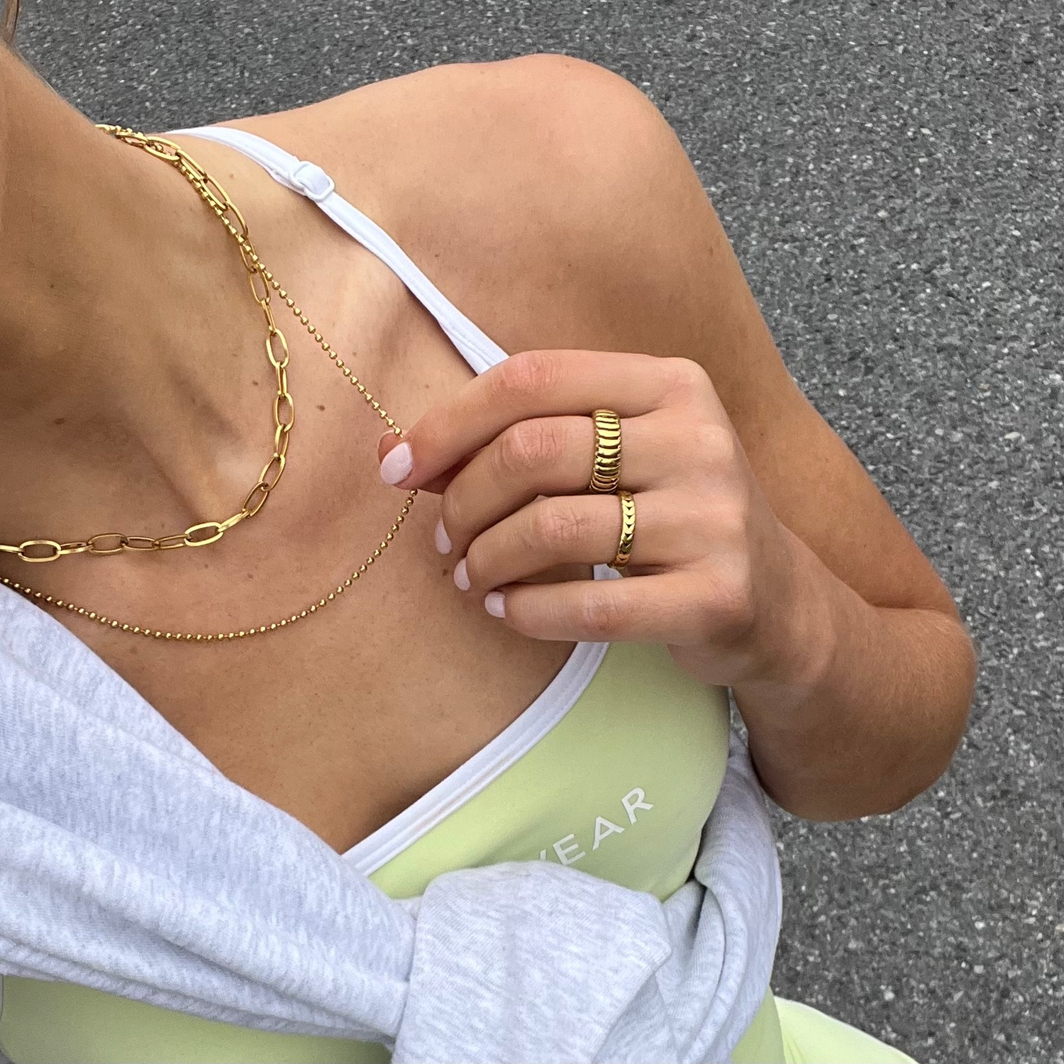 EVER_Activewear_jewellery_Gold_Necklace_and_Ring_Bundle_Set_sweat_resistant_waterproof_anti-tarnish_durable_lifestyle_wearing_activewear_walking_outside