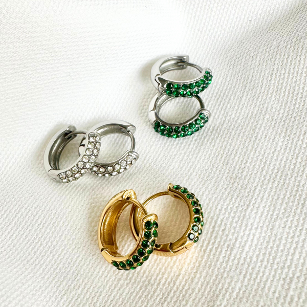 gravitate-silver-emerald-huggie-earrings-multiple-colours-flat-lay-ever-jewellery