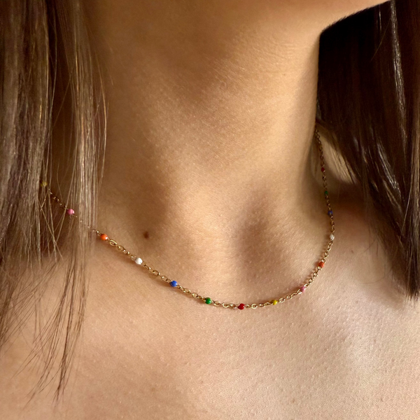 colour-wave-necklace-gold-enamel-bead-worn-close-up-ever-jewellery
