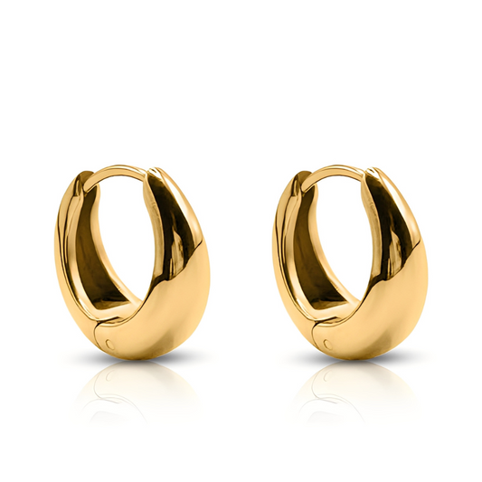 Pair of gold hoop earrings on a white background