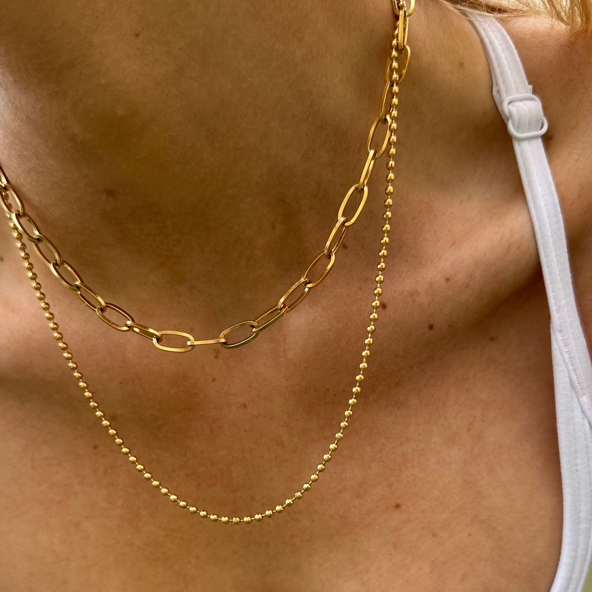 Double discount chain pendant