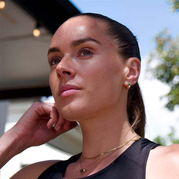 Edge Huggie Earrings styled - waterproof gold huggies with emerald and pearl detail - EVER Jewellery Australia