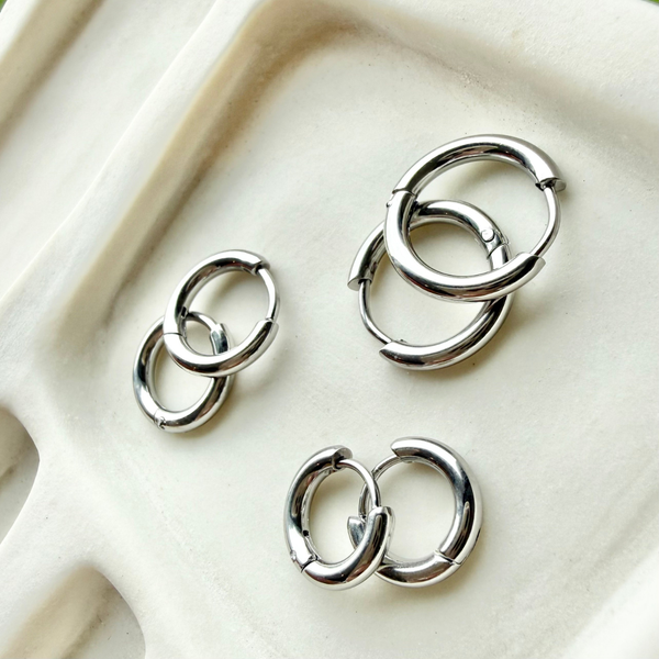 Metro Silver Huggie Earrings flat lay - waterproof anti-tarnish silver huggies Australia - EVER Jewellery