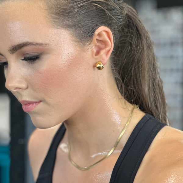 Movement Stud Earrings worn at gym - waterproof gold studs workout to dinner - EVER Jewellery Australia