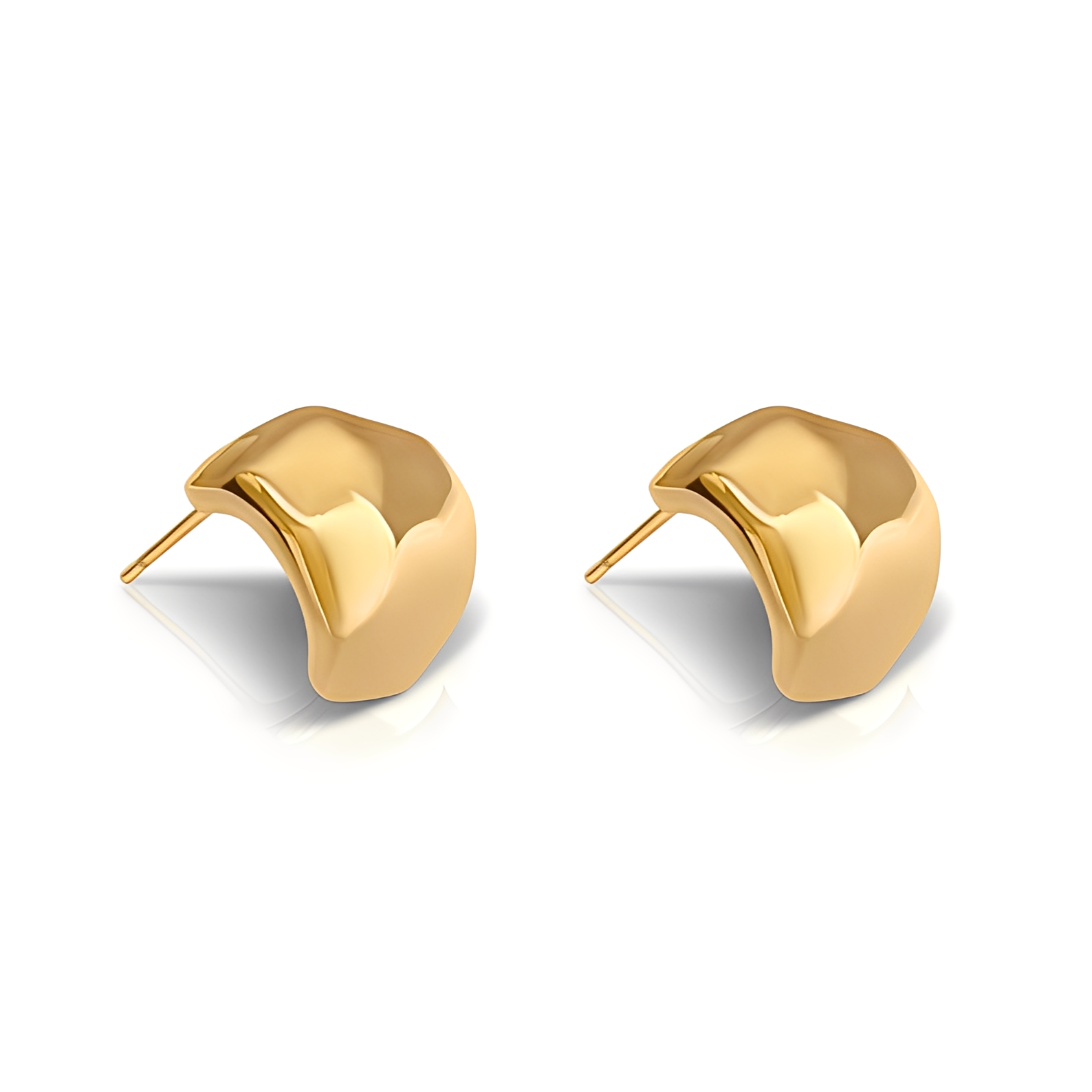 Gold earrings on a white background