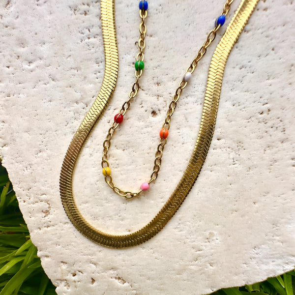 colour-wave-necklace-with-gold-snake-chain-flatlay-ever-jewellery