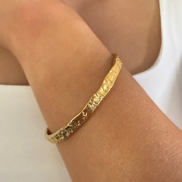 Strike Cuff on wrist - waterproof anti-tarnish hammered gold cuff - EVER Jewellery
