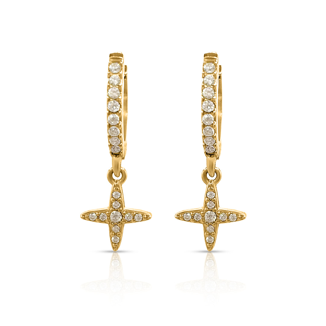 Gold hoop earrings with star designs and clear gemstones on a white background