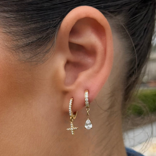 Striker Huggie Earrings styled - waterproof gold huggies crystal cross charm detail - EVER Jewellery Australia