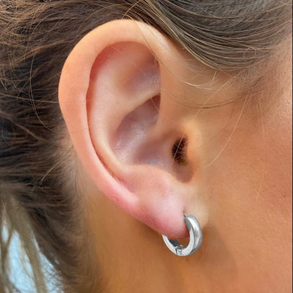 trackside-silver-huggie-earrings-minimalist-silver-hoops-EAR-shot-ever-jewellery