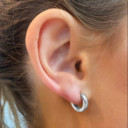 trackside-silver-huggie-earrings-minimalist-silver-hoops-EAR-shot-ever-jewellery