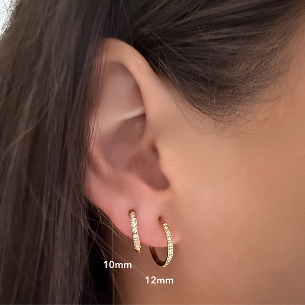 Transition Gold Huggie Earrings on ear - waterproof gold huggies four sizes - EVER Jewellery