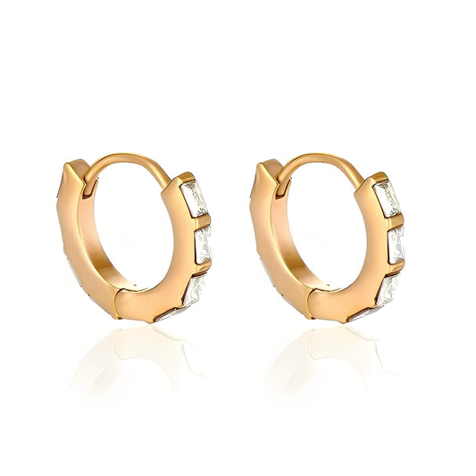 Gold hoop earrings with embedded stones on a white background