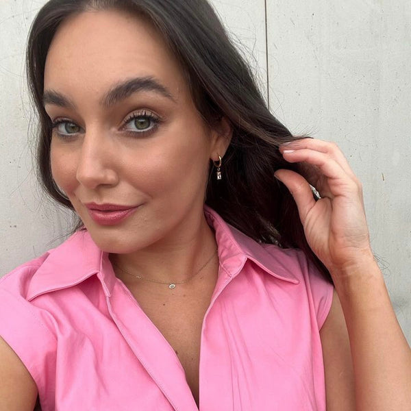 Luxe Gold Drop Earrings styled - waterproof gold huggie with cubic zirconia drop - EVER Jewellery Australia