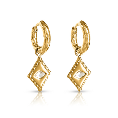  Arena Huggie Earrings – gold huggie earrings with diamond-shaped textured charm on white background