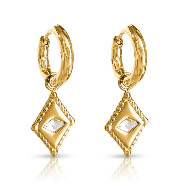  Arena Huggie Earrings – gold huggie earrings with diamond-shaped textured charm on white background