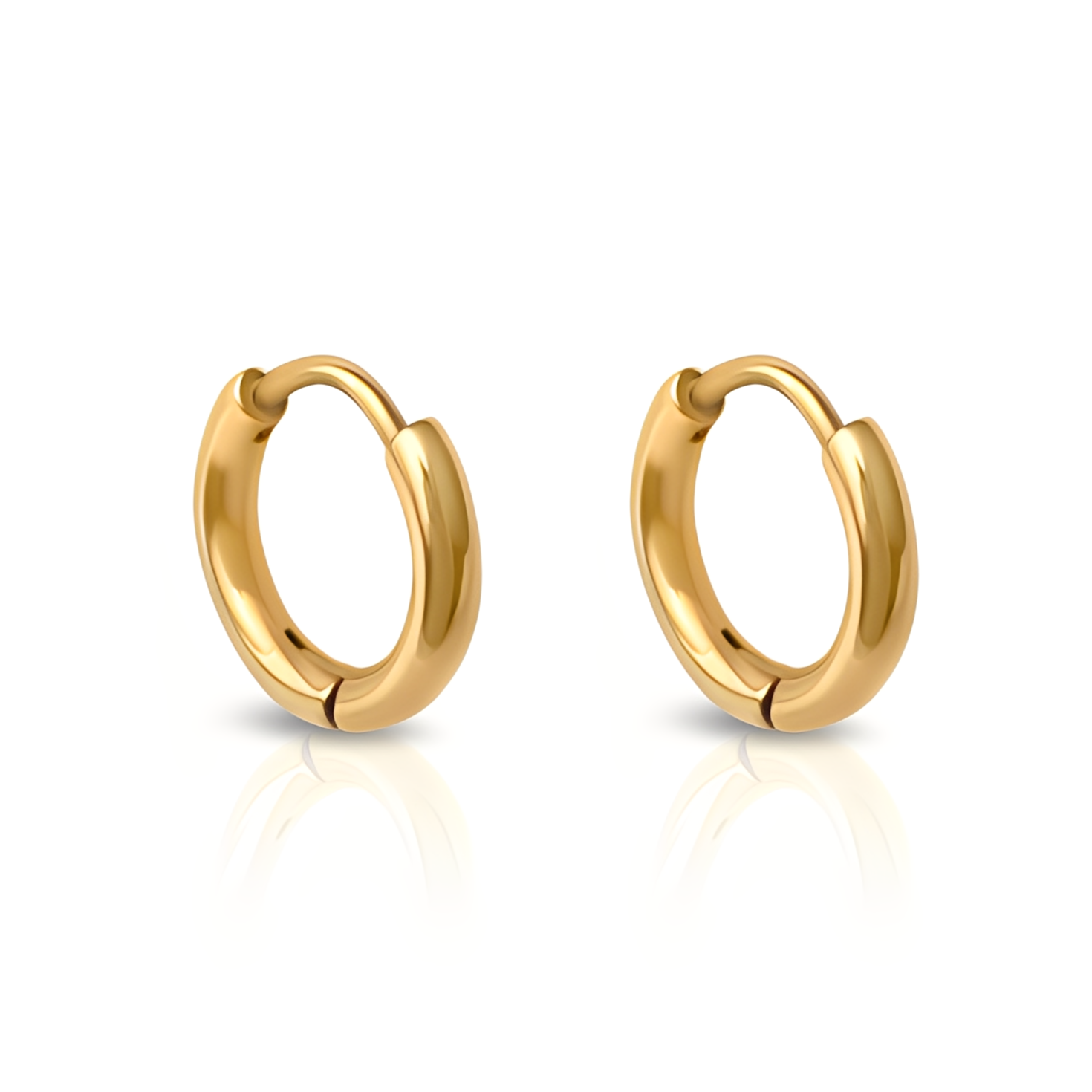 Gold hoop earrings on a white background