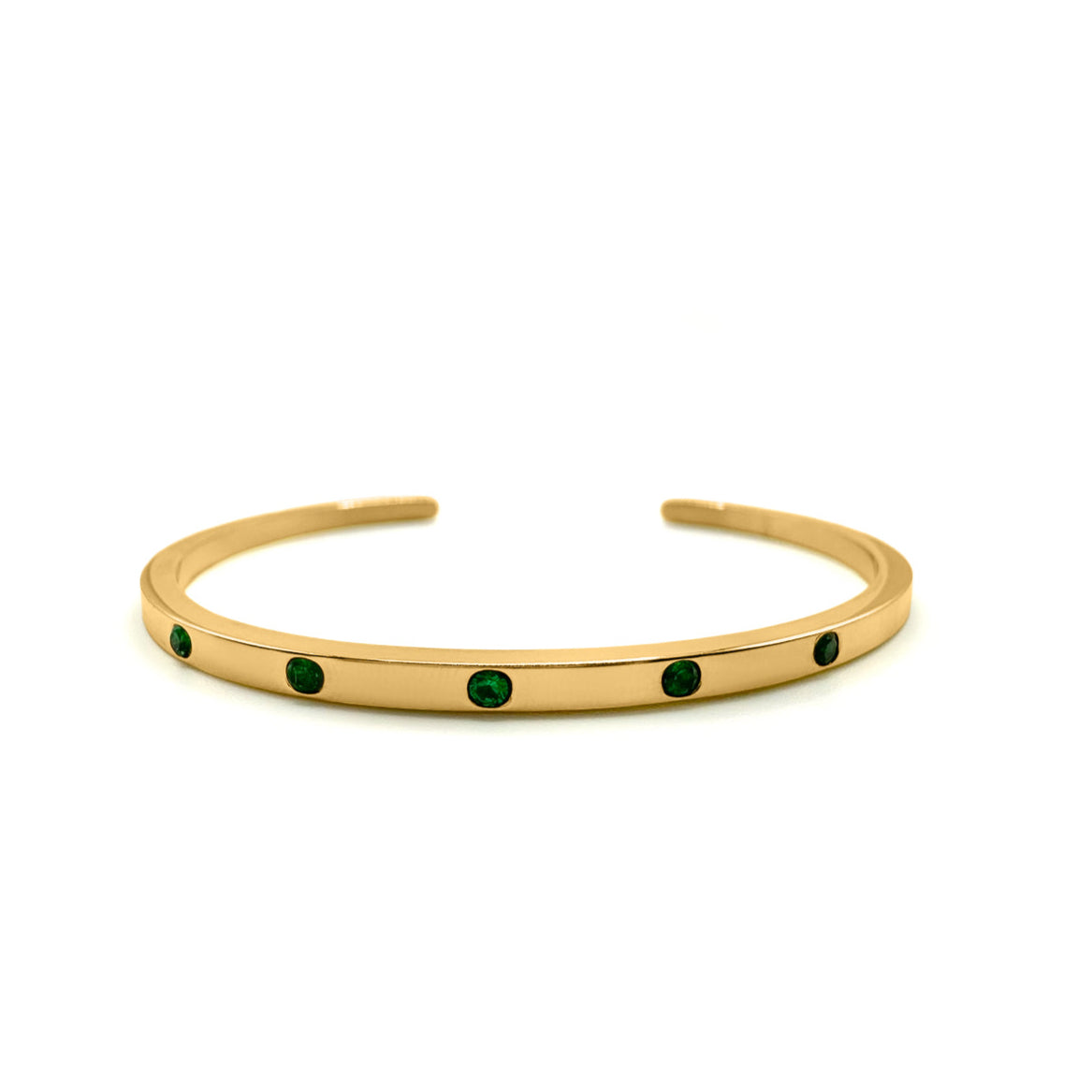 EVER Playmaker Cuff Bracelet in gold-plated stainless steel featuring six round emerald-green stones, displayed on a white background.