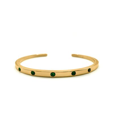 EVER Playmaker Cuff Bracelet in gold-plated stainless steel featuring six round emerald-green stones, displayed on a white background.