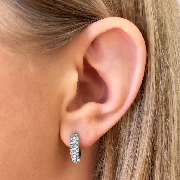 gravitate-silver-hoop-earrings-worn-on-ear-close-up-ever-jewellery
