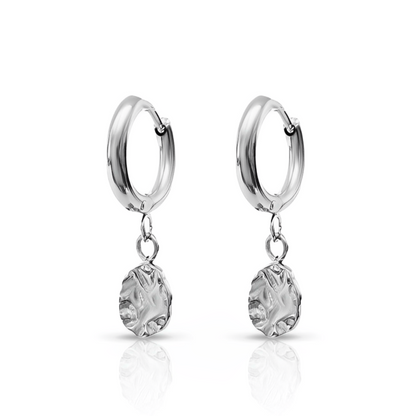 Harmony Silver Huggie Earrings – waterproof silver huggies with textured disc charms