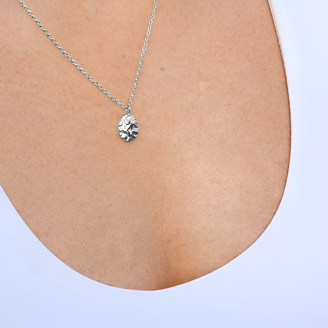 Harmony Silver Necklace worn on skin – minimal silver pendant with anti-tarnish chain, styled for everyday wear
