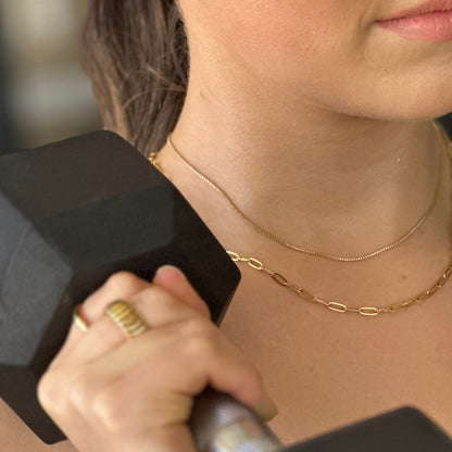 Laneway Chain stacked for a bold statement – sleek meets strong. Team with Time Out Chain necklace.