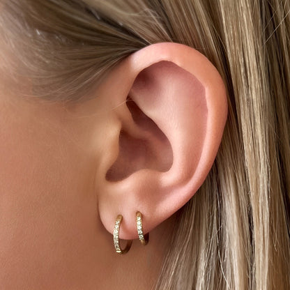 Transition Sleeper Gold Earrings worn in double ear piercings – 8mm and 10mm hoop combo for layered look