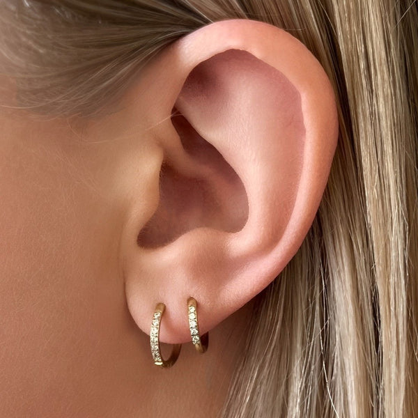Transition Gold Huggie Earrings on ear - waterproof anti-tarnish huggie earrings - EVER Jewellery
