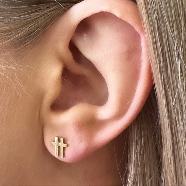 swish-gold-stud-earrings-worn-on-ear-close-up-ever-jewellery